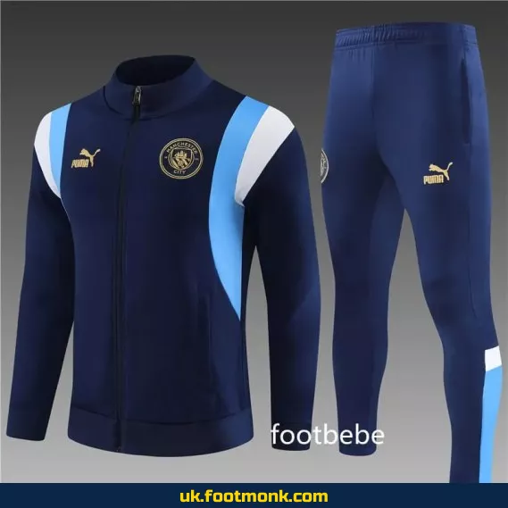 Manchester City 2023 2024 men's royal blue home kit.