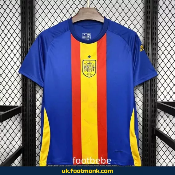 Spain jersey 2024 2025 pre-match blue red yellow.