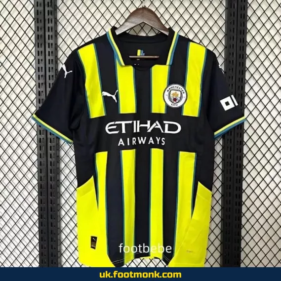 Manchester City 2024 2025 away yellow jersey.