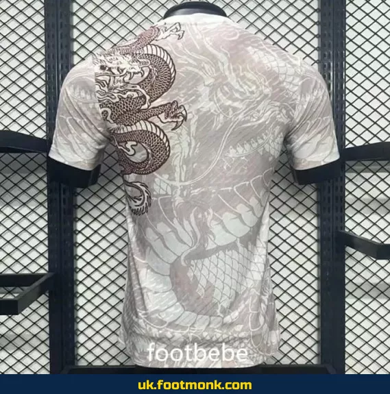 Match Jersey Real Madrid 2024 brown dragon.