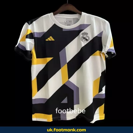 Real Madrid jersey 2023 2024 A houndstooth pattern.