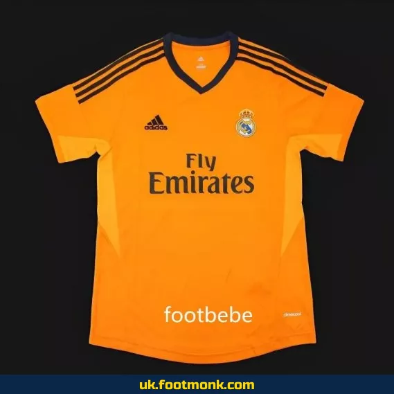 Real Madrid 2023 2024 goalkeeper jersey orange.