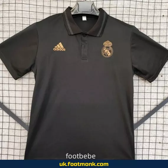 Real Madrid 2024 2025 black polo jersey.