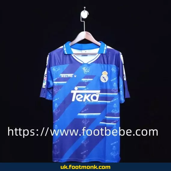 Vintage Real Madrid 1994-1996 away football jersey.
