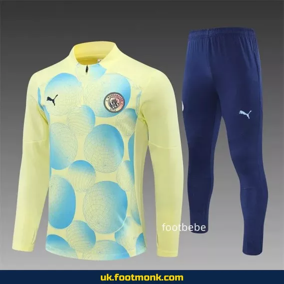 Manchester City 2024-2025 light yellow tracksuit.