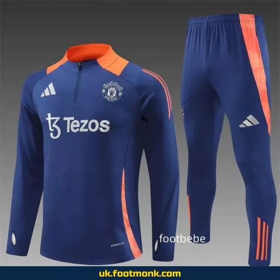 Manchester United 2024 2025 half-zip royal blue tracksuit.
