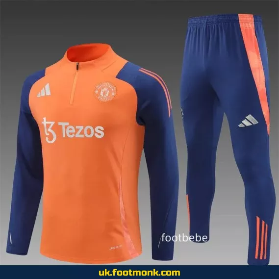 Manchester United 2024 2025 half-zip orange tracksuit.