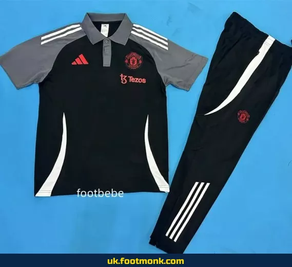 Manchester United 2025-2026 black tracksuit polo.