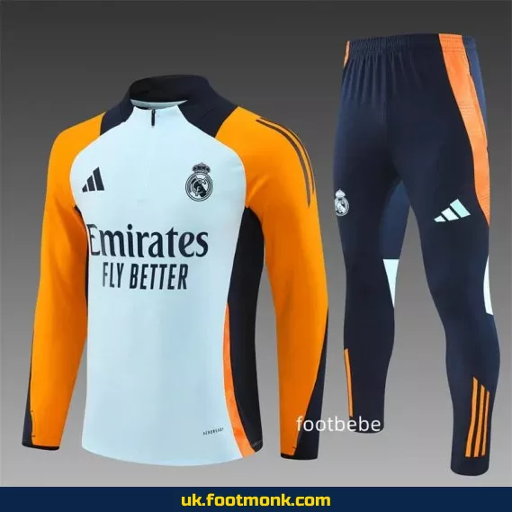 Real Madrid 2024 2025 half-zip light blue tracksuit.